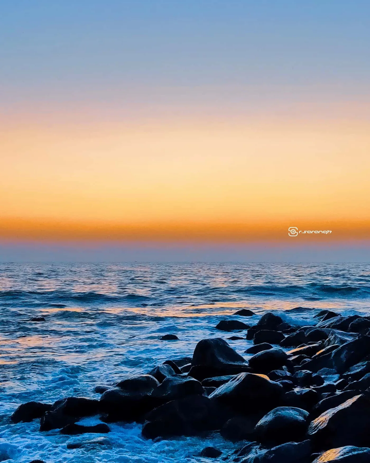 Sunset meeting the sea